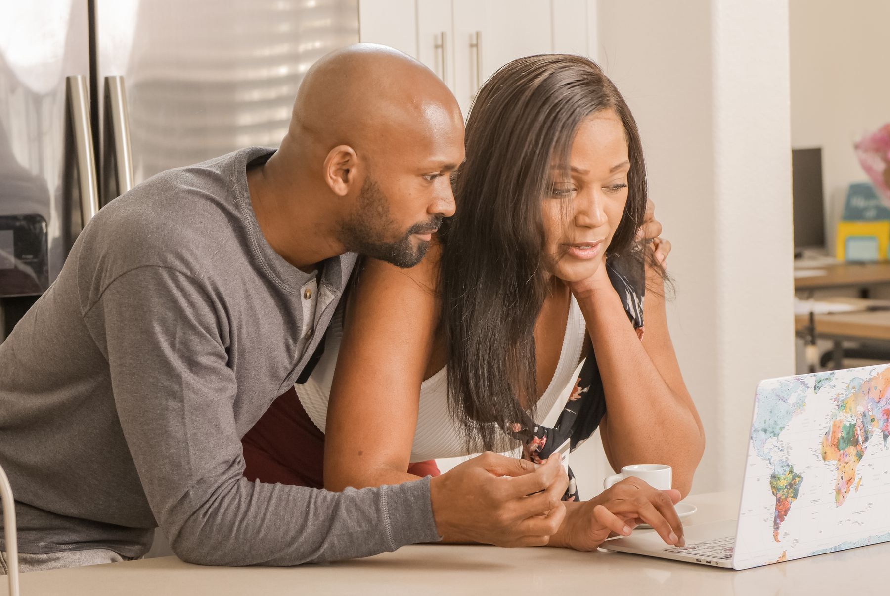 Couple reviewing options together while wedding shopping