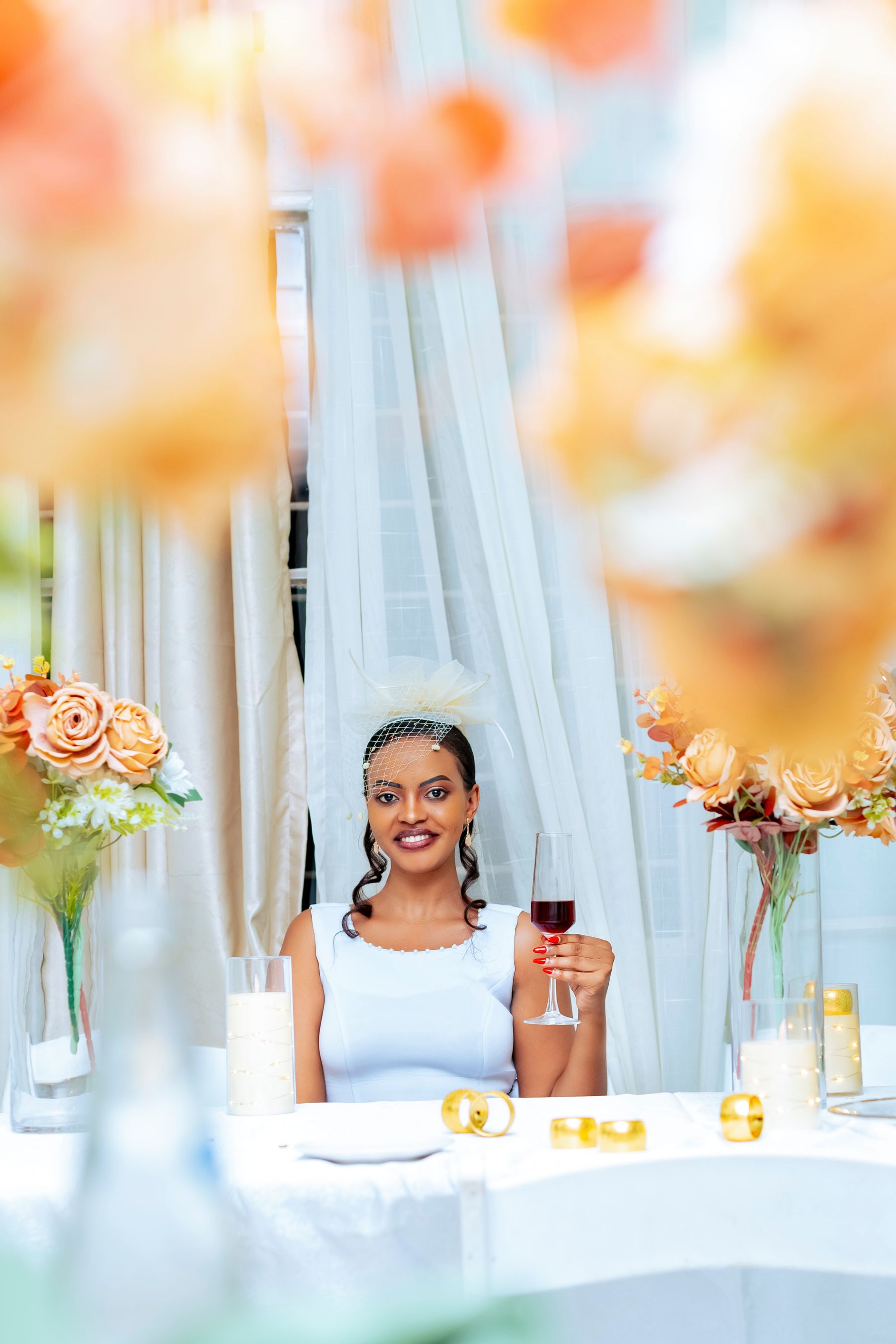 Bride raising a glass during an elegant wedding reception